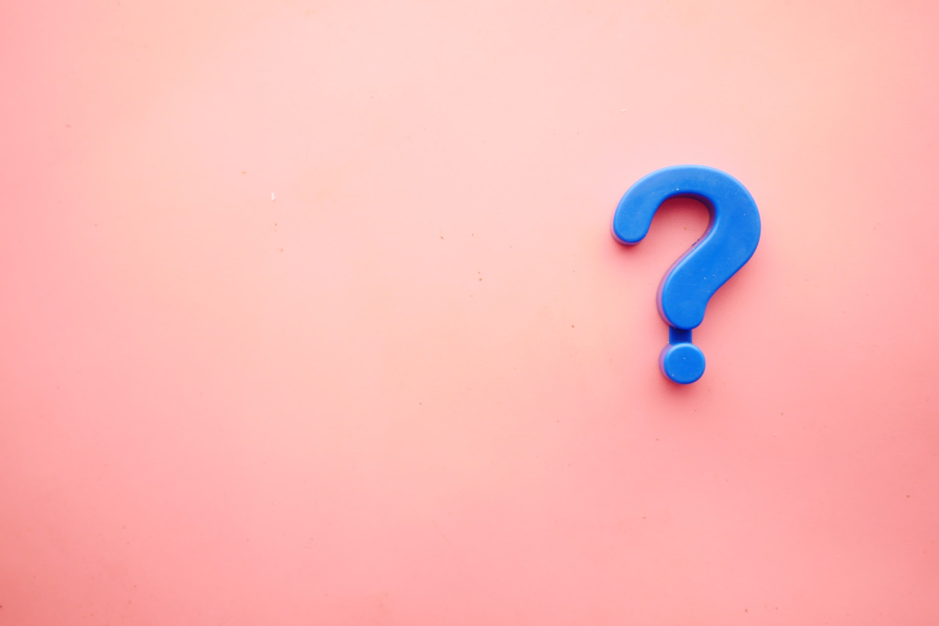 question-mark A blue question mark on a pink background