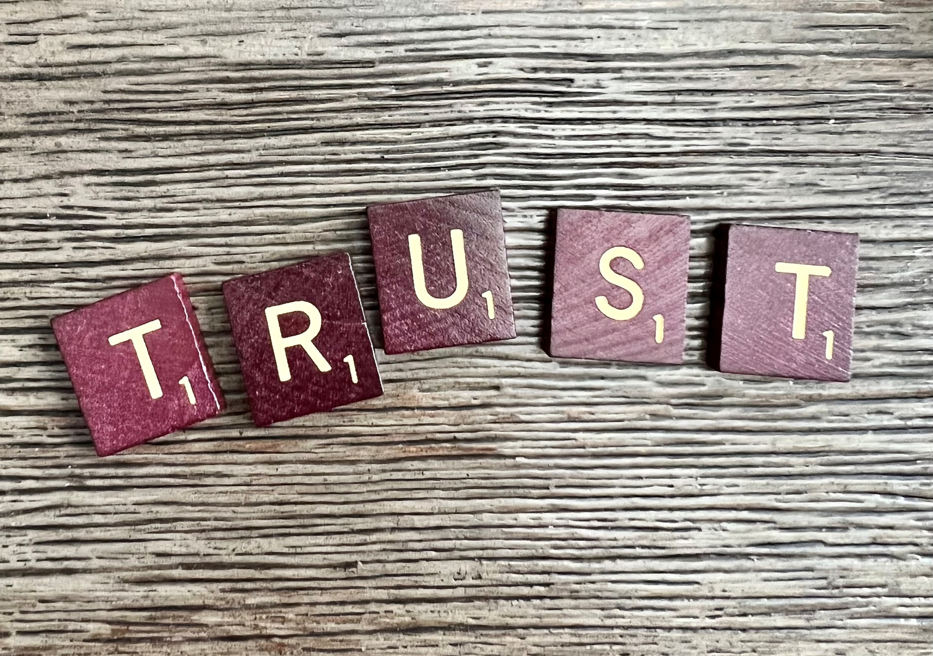 scrabble-tiles-spelling-out trust Scrabble tiles spelling out trust