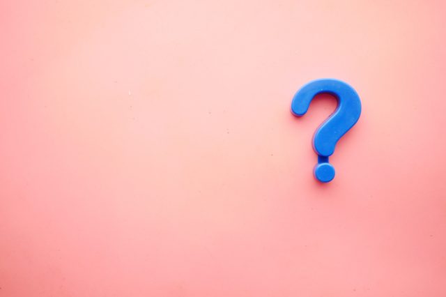 question-mark A blue question mark on a pink background