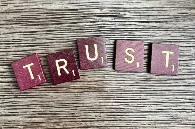 scrabble-tiles-spelling-out trust Scrabble tiles spelling out trust